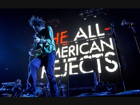 The All-American Rejects performing on stage with band name in lights, ahead of their Las Vegas House Party Tour date