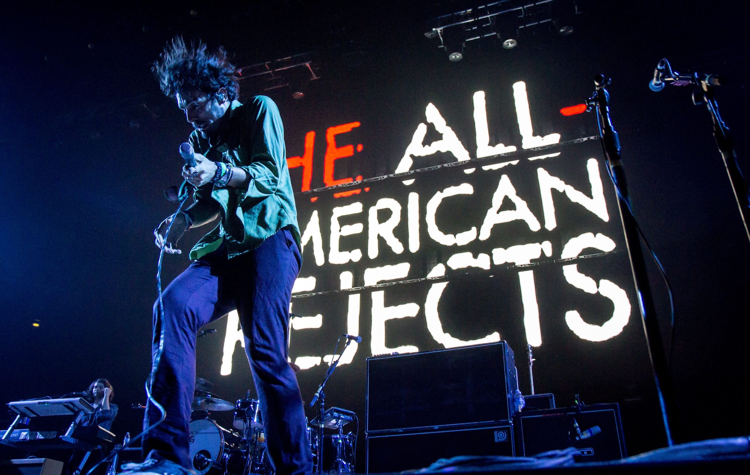 The All-American Rejects performing on stage with band name in lights, ahead of their Las Vegas House Party Tour date