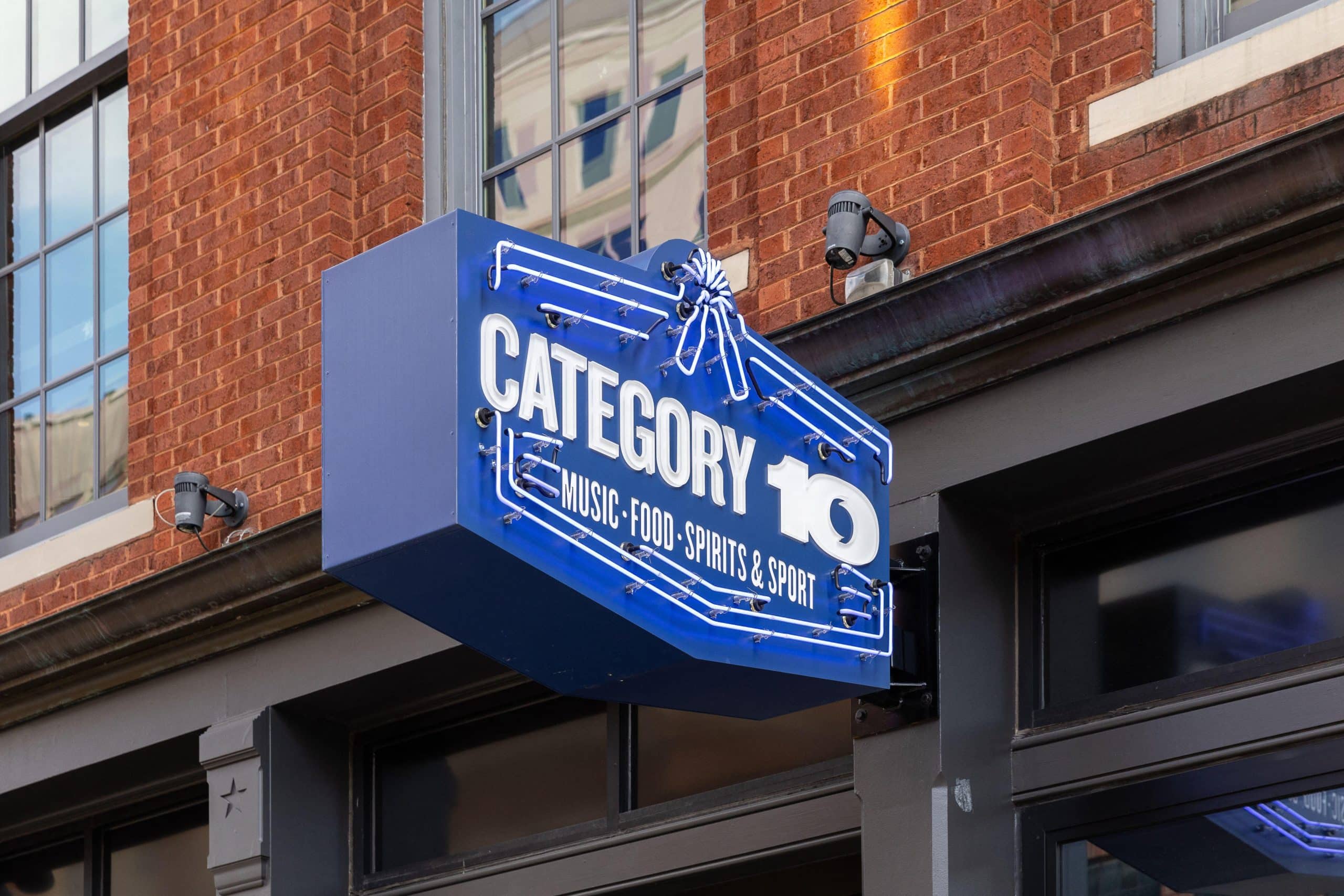 The Category 10 neon sign on a brick corner building in Las Vegas