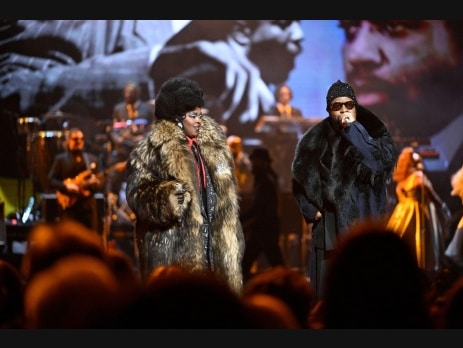 Ms. Lauryn Hill and Wyclef Jean performing together on stage