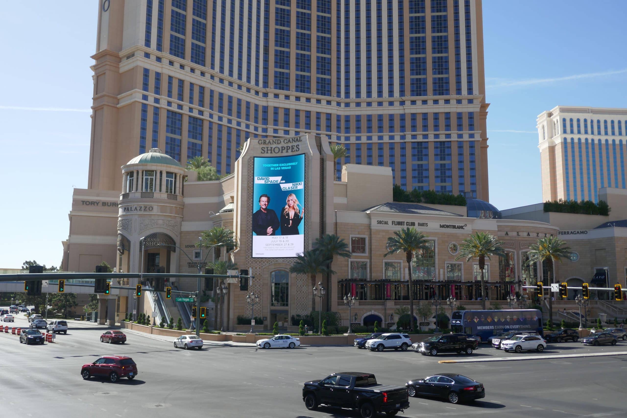 David Spade and Nikki Glaser co-headlining billboard on the Las Vegas Strip outside The Palazzo